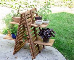 Then, lay a tray on the boards. 13 Cool Creative Diy Plant Stand Ideas The Garden Glove