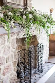 Beautiful Mantle Decor By Village Floral For This Winter Wedding At The Inn At Leola Village Wedding Mantle Wedding Fireplace Green And White Wedding Flowers