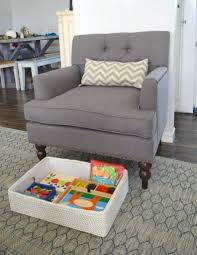 7 Cool Ideas For Organizing Toys In The Living Room How To Have A Family Friendly Living R Kid Friendly Living Room Living Room Toy Storage Family Room Design