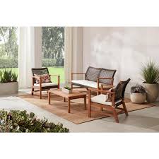 Hampton Bay Clover Cay 4 Piece Wicker Outdoor Patio Conversation Seating Set With Off White Cushions Tb1803wakd The Home Depot In 2020 Conversation Set Patio White Cushions Outdoor Lounge Furniture