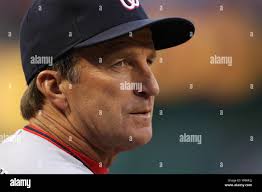 In this May 18, 2010 photo, Akiko Okada, of Sagamihara-shi Japan, laces up  her leather crafting project, a hat bag, at the home of Sheridan leather  crafter Clint Fay prior to the