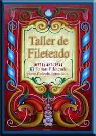 yapan taller de fileteado porteno fuente de letras mujer en la ventana