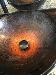 water film off a glass vessel bowl sink
