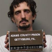 Lunging at officer with knife lands man in state pen