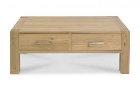 The coffee table offers charming traditional styling finished in either an antique white finish with dark taupe tops or antique mahogany. Turin Light Oak Coffee Table