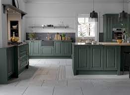 A dark green kitchen in london with cabinets from the real shaker kitchen line from uk cabinetmaker devol. Georgian Ermine Kitchen In Forest Green Wren Kitchens