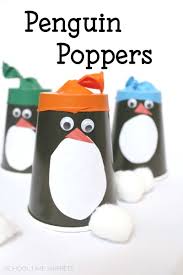 Fold the top left side toward the center so that it mirrors the right side. Paper Cup Penguin Craft School Time Snippets