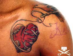 War Torn Peace Sewn Broken Heart Tattoo Heart Tattoo For Men Broken Tattoo