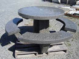 This commercial concrete picnic table has been designed for use in outdoor public spaces. Round Picnic Tables Aggregate Concrete Tables Weather Resistant