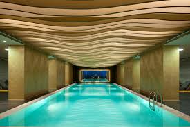 The clear sides make the interior visible giving the pool a futuristic appearance. Indoor Pools Bringing The Tranquility Of Water To Interiors Archdaily