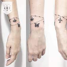 Butterfly And Cross Bracelet Tattoo Designs Wrist Bracelet Tattoo Arm Band Tattoo Wrist Tattoos