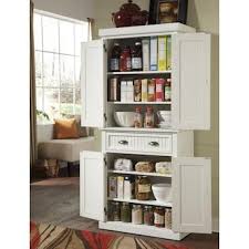 Home Styles Nantucket White Sanded And Distressed White Asian Hardpantry Lowes Com In 2020 White Kitchen Cart Kitchen Remodel Cost Kitchen Trends
