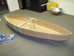 How To Make A Cardboard Canoe For Your Kids In The Pool Make A Boat Cardboard Boat Cardboard Boat Race