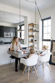 Concrete Table Eames Dining Chairs Scandinavian Industrial Dining Room In New Yor Scandinavian Dining Room Dining Room Industrial Industrial Dining Chairs