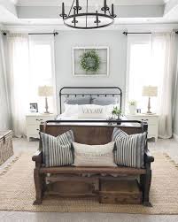 I Adore This Farmhouse Style Bedroom With The Antique Wood Bench At The End Of T Farmhouse Style Master Bedroom Bedroom Decor Inspiration Master Bedrooms Decor