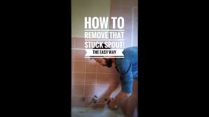 Remove any caulking around the wall end of the tub spout with a putty knife or razor. How To Remove Corroded Bath Spout Youtube