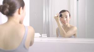 This twisted bun hair is simple but elegant and perfect for a casual evening or even for your wedding hair dream. Skincare Woman Asian Hd Stock Video 524 478 727 Framepool Stock Footage
