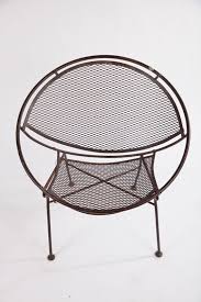 There are 39 clam shell chair for sale on etsy, and they cost $571.23 on average. Set Of 4 Mid Century Metal Hoop Chairs Tempestini Salterini Vintage Iron Clamshell Hoop Patio Chairs 4 Available Hoop Chair Chair Patio Chairs
