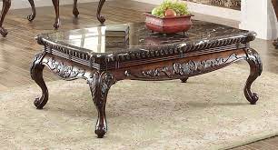 This coffee table set takes the luxe look to another level with faux marble tabletops. Mariacarla Brown Wood Coffee Table With Marble Top By Homelegance