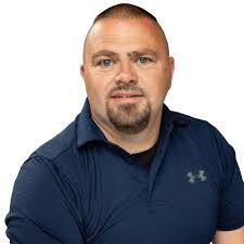 Picking up sticks in the yard with dad