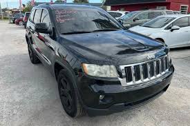 Image result for Brilliant Black 2013 Grand Cherokee
