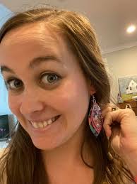 Loving my new Lisa frank earrings!! They are perfect for my 90s themed 30th  birthday party! I put them