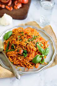 Garlic Tomato Basil Sweet Potato Noodles Solluna By Kimberly Snyder Recipe Sweet Potato Noodles Sweet Potato Noodles Recipe Healthy Eating Recipes
