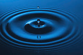 Water drop falling into water making a concentric circles Photograph by  Ognian Setchanov