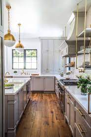 Choose from a variety of stylish cabinet hardware to update your current or new cabinets. 20 Fabulous Kitchens Featuring Grey Kitchen Cabinets The Happy Housie