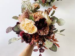 Finding the right flowers to accompany the silk bridal bouquet is one of our specialties. Fall Wedding Bouquet W Burgundy Champagne Colors Autumn Etsy