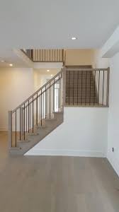 Maybe you would like to learn more about one of these? White Oak Stair Constructed With Closed Risers Closed Stringer Both Sides Railing System Constructed With 2 Oak Stairs Stairs Design Metal Spindles Staircase