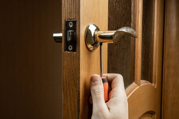 Hearth & Home Locksmith technician working in Ogden