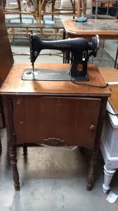 The appeal of vintage singer sewing machine cabinets resides in their history, decorative design and versatility. Sold Price Vintage Singer Sewing Machine In Cabinet Invalid Date Mst