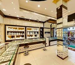 We design and construct jewellery stores and display booths , with every attention to detail, feature unique designs , to fit harmoniously in any boutique's environment and incarnate your jewels. Silver Display Style Jewelry Store Interior Showroom Interior Design Jewelry Store Design