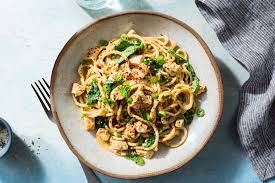 Spicy Sichuan dan dan noodles with tofu and kale