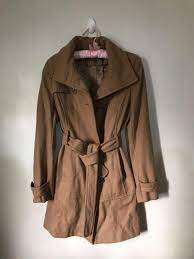 This puffer jacket features a 100% polyester shell with 60% duckdown filling and 40% waterfowl feathers, a zip up and snap up front, banded hem and cuffs, dual button flap pockets at the front, slant pockets at the chest, and fashionable wool overlay detail at elbows and shoulders. Kenneth Cole Reaction Wool Blend Camel Coat Women S Fashion Coats Jackets And Outerwear On Carousell