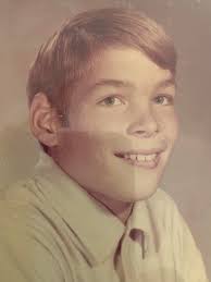 Can someone remove the shadows from his face for an obituary photo?