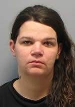 Woman arrested after North Grand shooting