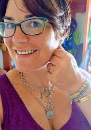 Went to see my grand daughter today and ended up wearing my necklace in  quite a different way. You think it'll catch on?