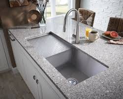 Many people choose an undermount sink because its design makes it easier to clean. Kitchen Sinks With Drainboard Design Modern Kitchen Modern Kitchen Sinks Kitchen Sink Design Sink Design