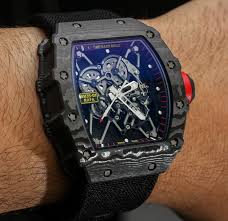 Nadal has been wearing the watch throughout the french open, where he just won his 13th men's singles final. Richard Mille Rm 35 01 Rafael Nadal Ntpt Carbon Watch Hands On Ablogtowatch