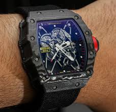 This is why nadal can wear these the richard mille rm 035 entered the market in 2011 and is considered one of the more affordable rafael nadal watches. Richard Mille Rm 35 01 Rafael Nadal Ntpt Carbon Watch Hands On Ablogtowatch