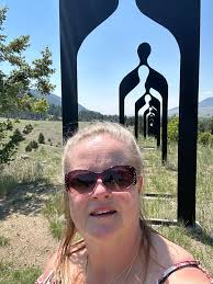 Leaving a memorial rock in Montana at 7 generations sculpture