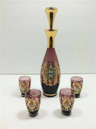 Vintage Murano Azure Purple And Gold Glass Decanter Set 4 Liqueur Hand Painted Glass Decanter Set Glass Gold Glass Purple color glass decanter of desirable rim thickness and finish can genuinely elevate your overall drinking experience. glass decanter set