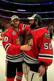 Corey Crawford 50 Celebrates With Brandon Saad 20 Chicago Blackhawks Hockey Blackhawks Brandon Saad