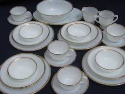 While vintage collectors of our age. Gold Edge On White Swirl Vintage Fire King Glass Dishes Set For 4