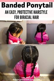 You want to mix up your styling so you don't put too much pressure on your scalp, causing traction alopecia. Mixed Kids Hairstyle Banded Ponytail For Biracial Curly Hair