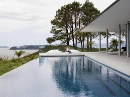 9 Examples Of Infinity Edge Swimming Pools With Amazing Views Modern Pools Infinity Pool Pool Designs
