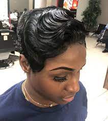It is 1920s back way hairstyle and it is still in fashion these days: 6 Finger Waves Hairstyles For Black Women To Rock Hairstylecamp