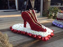 Flowers 24 hours can also make up custom designed funeral flowers for london funerals. Funeral Flowers Glitzy Red Shoes Funeral Flower Tributes Bespoke Funeral Flower Tributes Unusual Flowers Fo Funeral Flowers Unusual Flowers Funeral Tributes